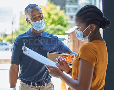 Buy stock photo Sign, covid and black woman with a delivery at the door with a happy delivery man in a face mask for safety compliance. Ecommerce, coronavirus and African girl customer with a clipboard for a box 