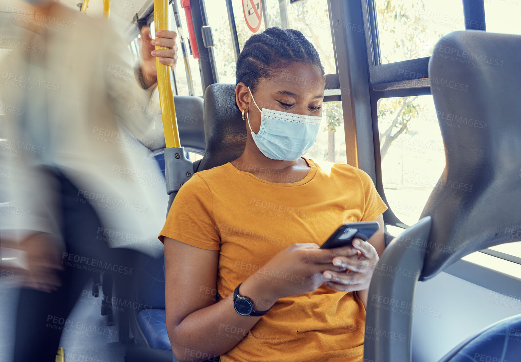 Buy stock photo Bus travel, covid and black woman, smartphone and social media, reading notification and 5g online mobile tech on transportation. Young girl, face mask and corona virus safety with cellphone on metro