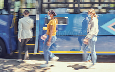 Buy stock photo Women, covid travel and bus stop in city morning commute, public transportation or local travelling in motion blur. Diversity, passenger and covid 19 face mask in vehicle healthcare safety compliance