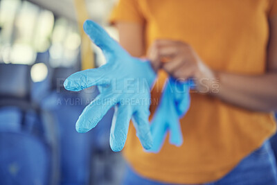 Buy stock photo Hand glove, covid safety and protection with cover for prevention and protection from covid 19, bacteria and disease in a pandemic. Health, wellness and public transport in a bus and travel in city
