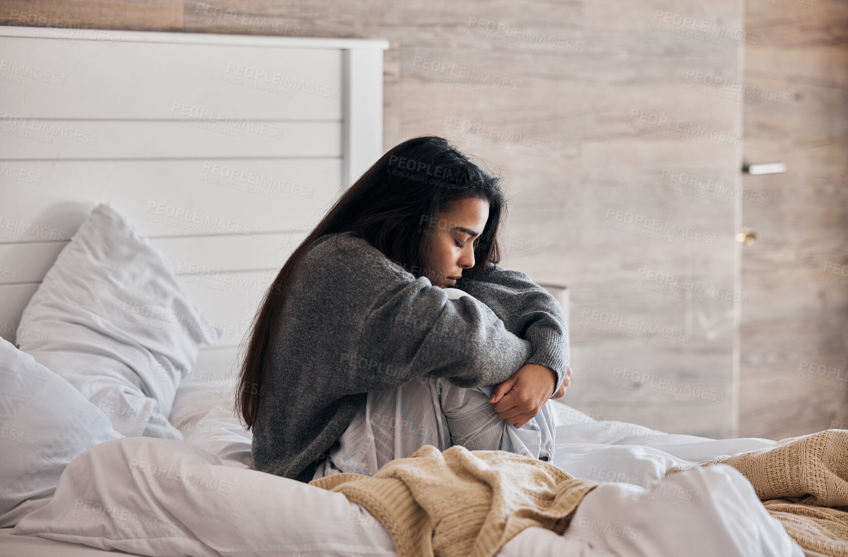 Buy stock photo Sad, depression and woman with stress in bedroom thinking of a break up, broken heart or mental health problems. Divorce, stressed or depressed girl with insomnia, anxiety or negative memory at home