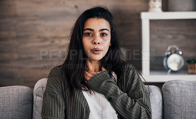 Buy stock photo Anxiety, worry and woman breathing on sofa to relax, calm down and stress relief from panic attack. Mental health, depression and portrait of anxious girl sitting on couch with hand on chest in pain