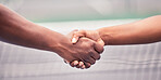 Closeup, handshake and sport for support, teamwork or respect outdoor at tennis court with diversity. Shaking hands, training and sports for fitness, exercise or training together with tennis player