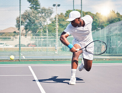 Black man, tennis and ball, fitness sport and racket with exercise, workout and training outdoor in summer. Athlete, sports and competition on tennis court , summer and game with action and match