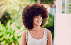 Black woman, girl and smile outdoor for wellness, break and enjoy holiday. Young female, lady and afro for confidence, happiness and relax in city, casual and trendy being stylish, edgy and chill. 