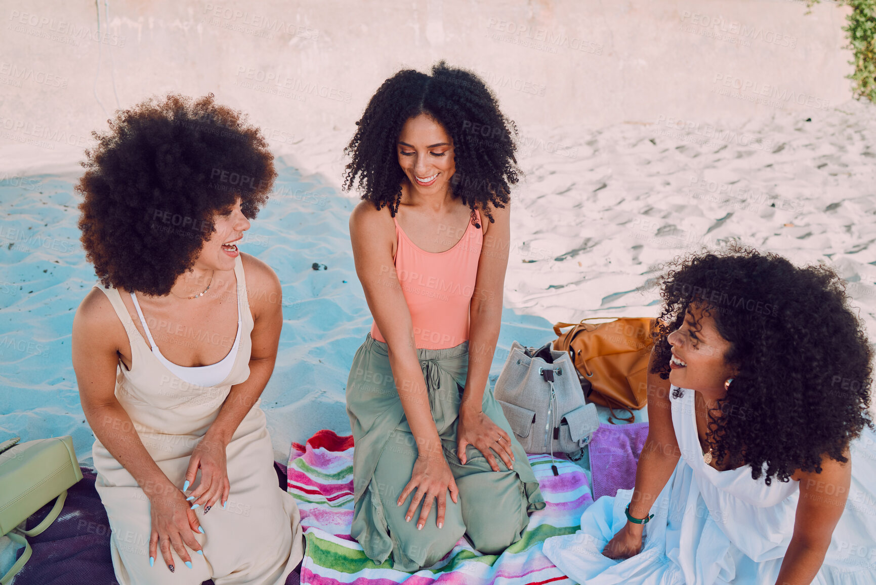 Buy stock photo Black woman, friends and laughing in relax at the beach for social get together, holiday or summer break. Happy African American women smile and enjoying fun traveling or relaxing on the sandy coast