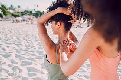 Buy stock photo Woman, friends and back sunscreen at the beach for healthy skincare, protection or moisturizer in the outdoors. Hands of female helping friend apply SPF, sunblock or lotion in care for health or skin