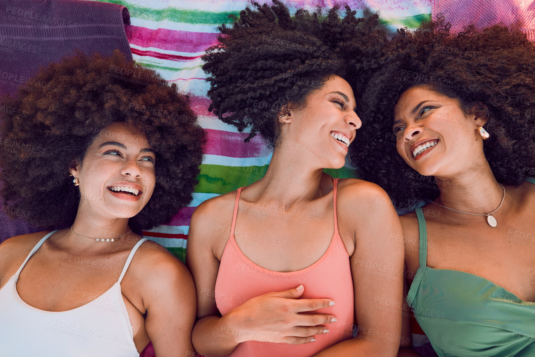 Buy stock photo African women, happy and friends on floor for support, love and care or bonding together at beach. Black girls, smile and friendship happiness, laughing with afro and fun on summer holiday
