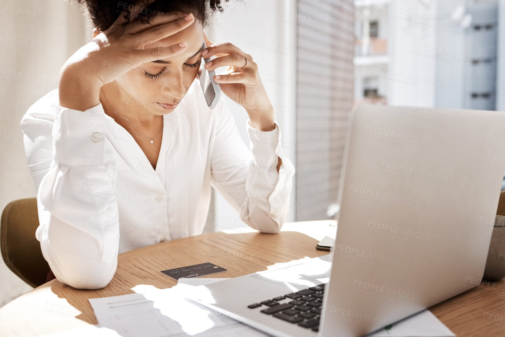 Buy stock photo Credit card, phone call and black woman frustrated for debt, bills or desk with laptop. African American lady, upset female or smartphone for connection, communication stress or talking payment query