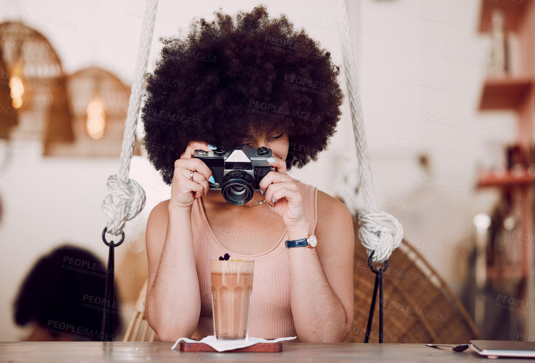 Buy stock photo Camera, photography and woman in coffee shop for content marketing, drink advertising and menu update on website or social media. Black woman influencer, photographer or content creator in restaurant