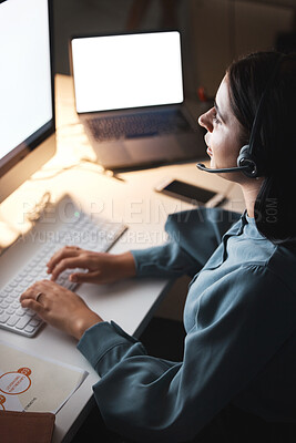 Buy stock photo Call center, customer service and communication with a woman consultant working late at night in her office. Crm, contact us and support with a female employee at work in telemarketing or sales