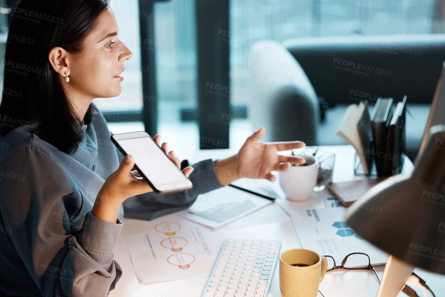 Buy stock photo Communication, office and business woman on a phone call for discussion, virtual meeting and talking to client. Startup, mockup screen and girl working, speaking and in conversation on smartphone