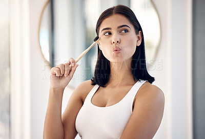 Buy stock photo Bathroom, cleaning and woman with bamboo toothbrush for brushing teeth, hygiene and dental care. Dentistry, healthcare and girl with thinking face using organic, natural and eco friendly products