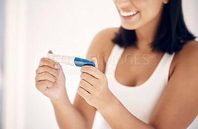 Buy stock photo Good news, smile and woman with pregnancy test in bathroom happy, excited and celebrate positive results. Fertility, love and pregnant woman ready for motherhood and future children, family and baby
