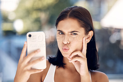 Buy stock photo Woman, phone selfie and funny face, portrait and picture for online, social media or internet post in the morning in home. Gen z girl, picture and facial expression with 5g mobile smartphone in house