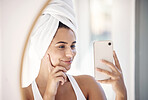 Mirror selfie, skincare and woman with phone for beauty, facial cleaning and hair care in a bathroom. Social media, self care and face reflection of a girl with a photo on a mobile of morning routine