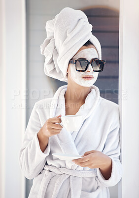 Buy stock photo Woman, beauty and skincare mask, tea and sunglasses at luxury spa, hotel and face mask while relax outdoor. Young female, bathrobe and facial outdoor, cosmetics and skin care with face wellness 
