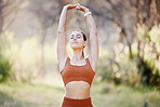 Meditation, yoga and zen woman in nature relaxing, training or stretching her body with freedom for a calm balance. Fitness, pilates and peaceful girl in a park to meditate for a mindfulness exercise