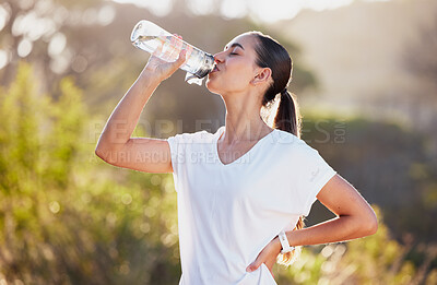 Buy stock photo Drinking water, fitness and exercise woman after sports run and training in nature. Workout, hiking and walking challenge with a bottle of a female runner in summer ready for running for health