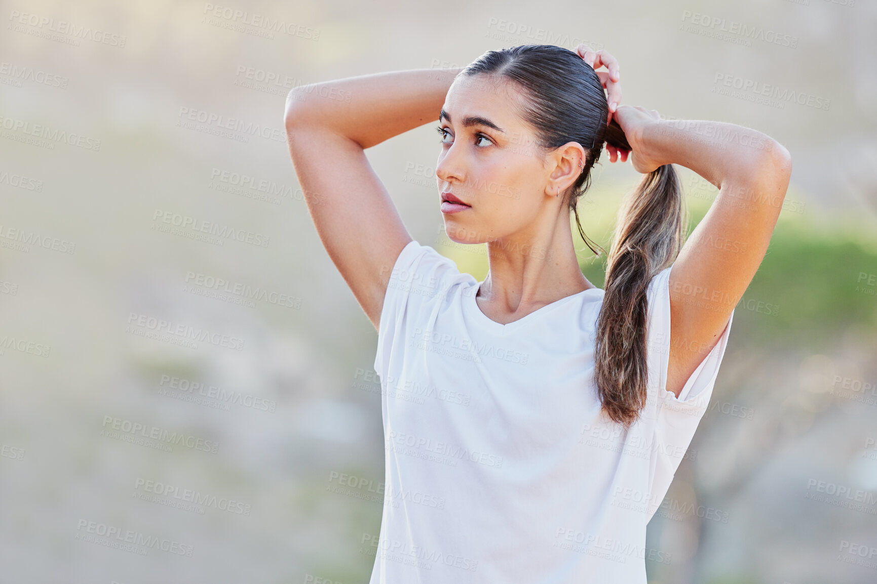 Buy stock photo Fitness, woman and start of run in a park, hair tie and wellness training, cardio and morning exercise in nature. Girl, begin and runner in a forest for workout, body and endurance goal on mockup 