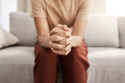 Buy stock photo Stress, worry and hands of woman on sofa with mental health issue, problem and anxiety at home. Depression, sadness and close up of connected hand of girl with fear, nervous and stressed expression