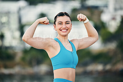 Fitness, portrait and woman flexing muscle, arms or biceps after strength  training, workout or exercise for power. Smile, sports and happy strong  girl bodybuilder athlete with growth development