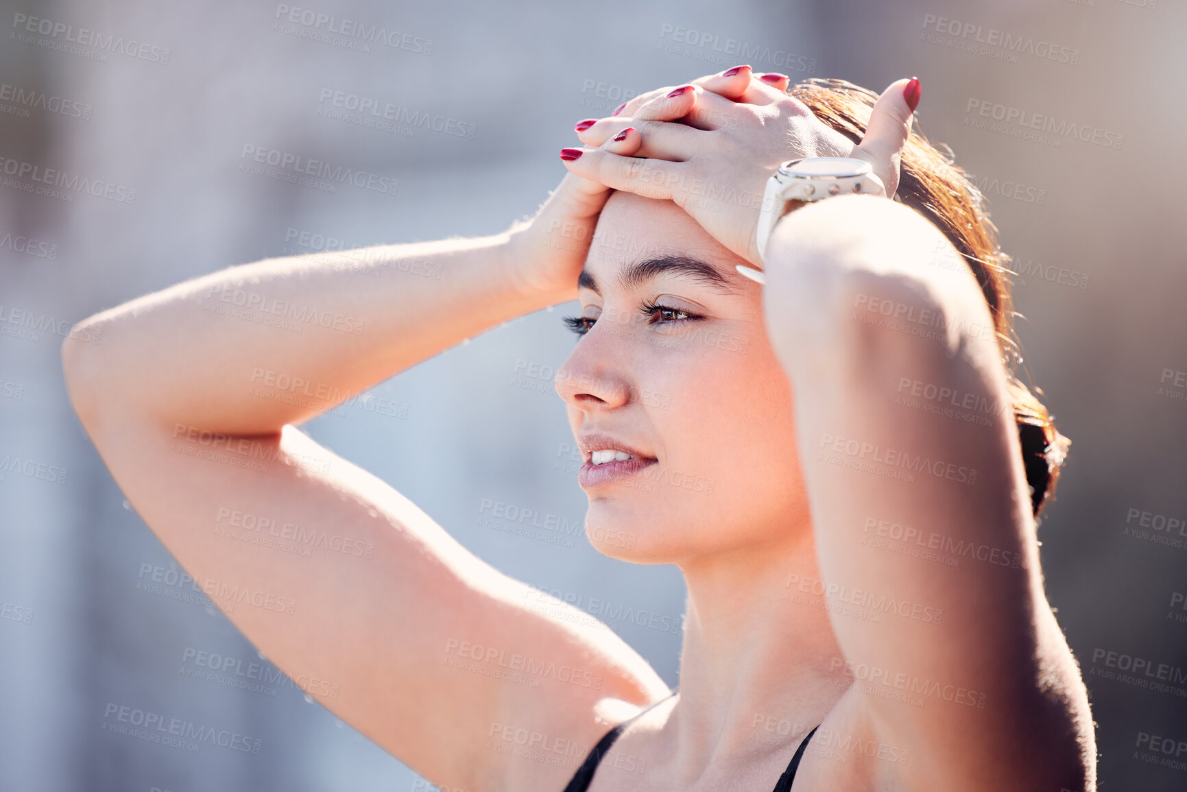 Buy stock photo Exercise, fitness and tired woman outdoor for a break to relax from running, workout and cardio training in summer for energy, rest and breathing. Exhausted female with hands on head after run