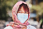 Muslim, covid and woman in face mask for compliance or safety in a city in Turkey after a medical coronavirus vaccine. Hijab, portrait and Islamic girl standing outdoors in a pandemic with protection