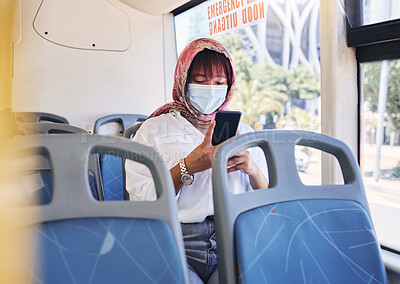 Buy stock photo Travel, covid and phone with muslim woman on bus by window for safety, technology and public transport. Health, internet and social media with girl typing on mobile for communication, global or virus