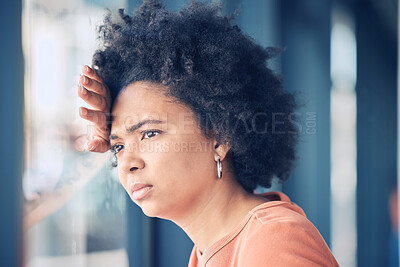 Buy stock photo Sad, lonely and depressed woman at window waiting, thinking and looking outside. Mental health, depression and anxiety, black woman with problem, stress or debt on her mind and life crisis feelings.