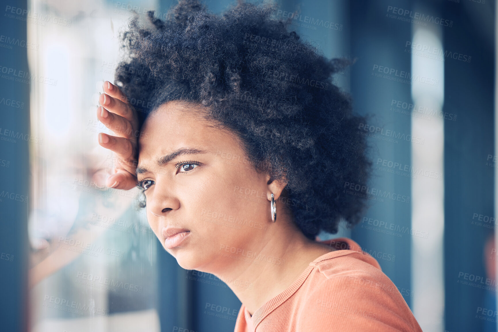 Buy stock photo Sad, lonely and depressed woman at window waiting, thinking and looking outside. Mental health, depression and anxiety, black woman with problem, stress or debt on her mind and life crisis feelings.