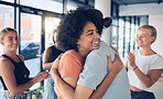 Hug, support and business people at a team building, collaboration and office meeting, party or social event. Happy, young and diversity office team, staff or employees with love, care and applause