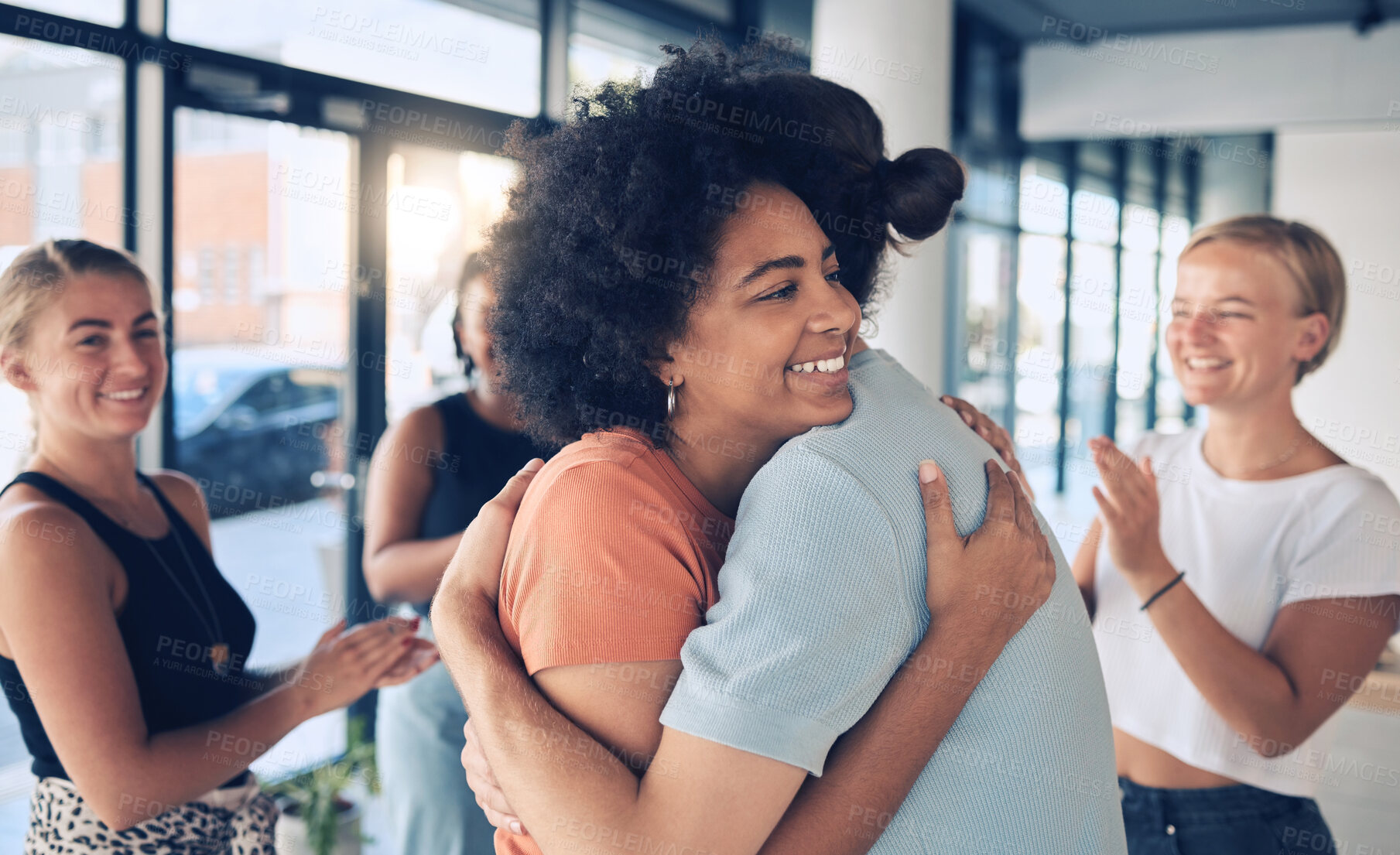Buy stock photo Hug, support and business people at a team building, collaboration and office meeting, party or social event. Happy, young and diversity office team, staff or employees with love, care and applause