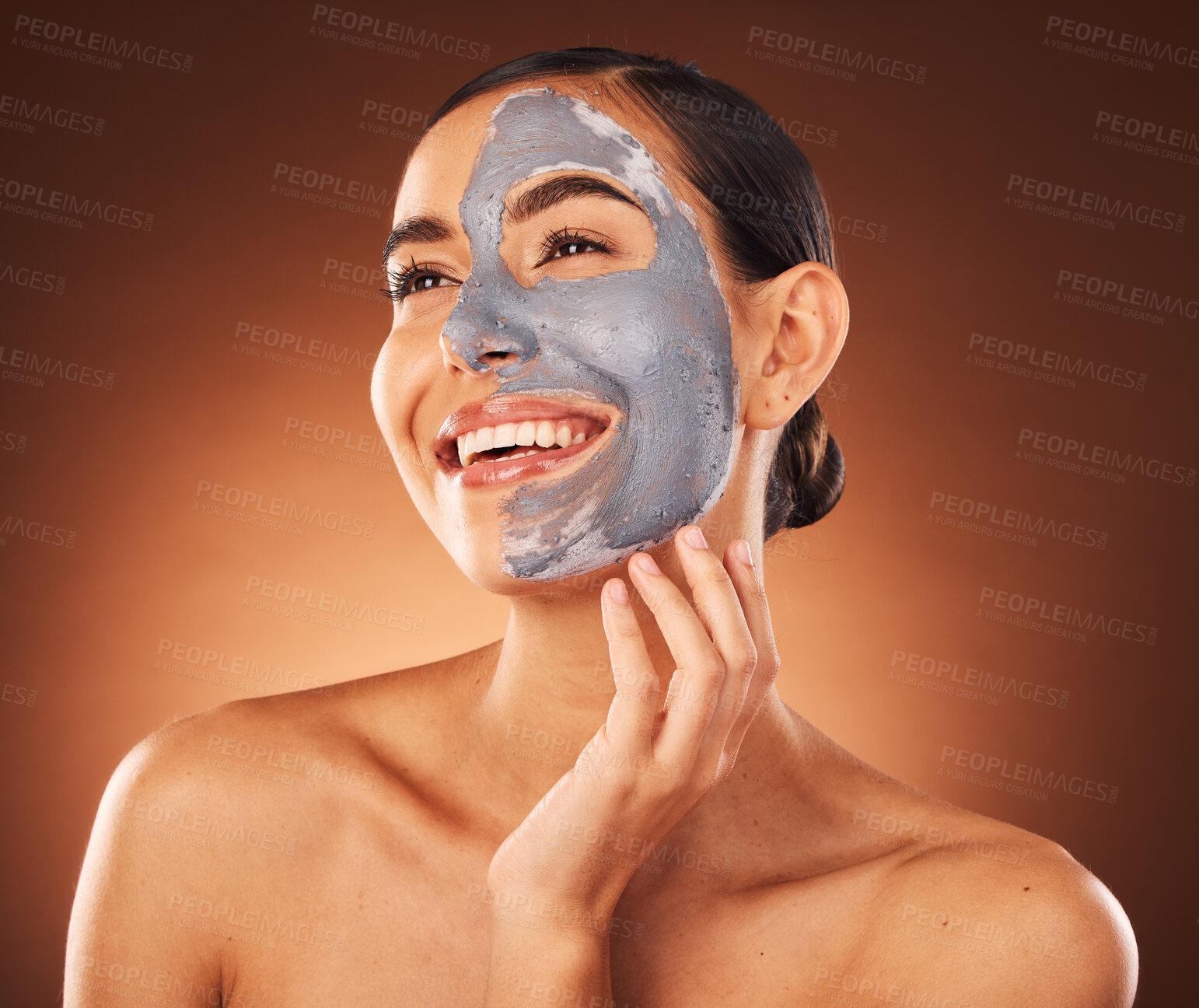 Buy stock photo Beauty, face mask and facial with skincare and woman, happy in cosmetic advertising against studio background. Skin, glow and natural cosmetics, charcoal mask with clean and hygiene with hydration.