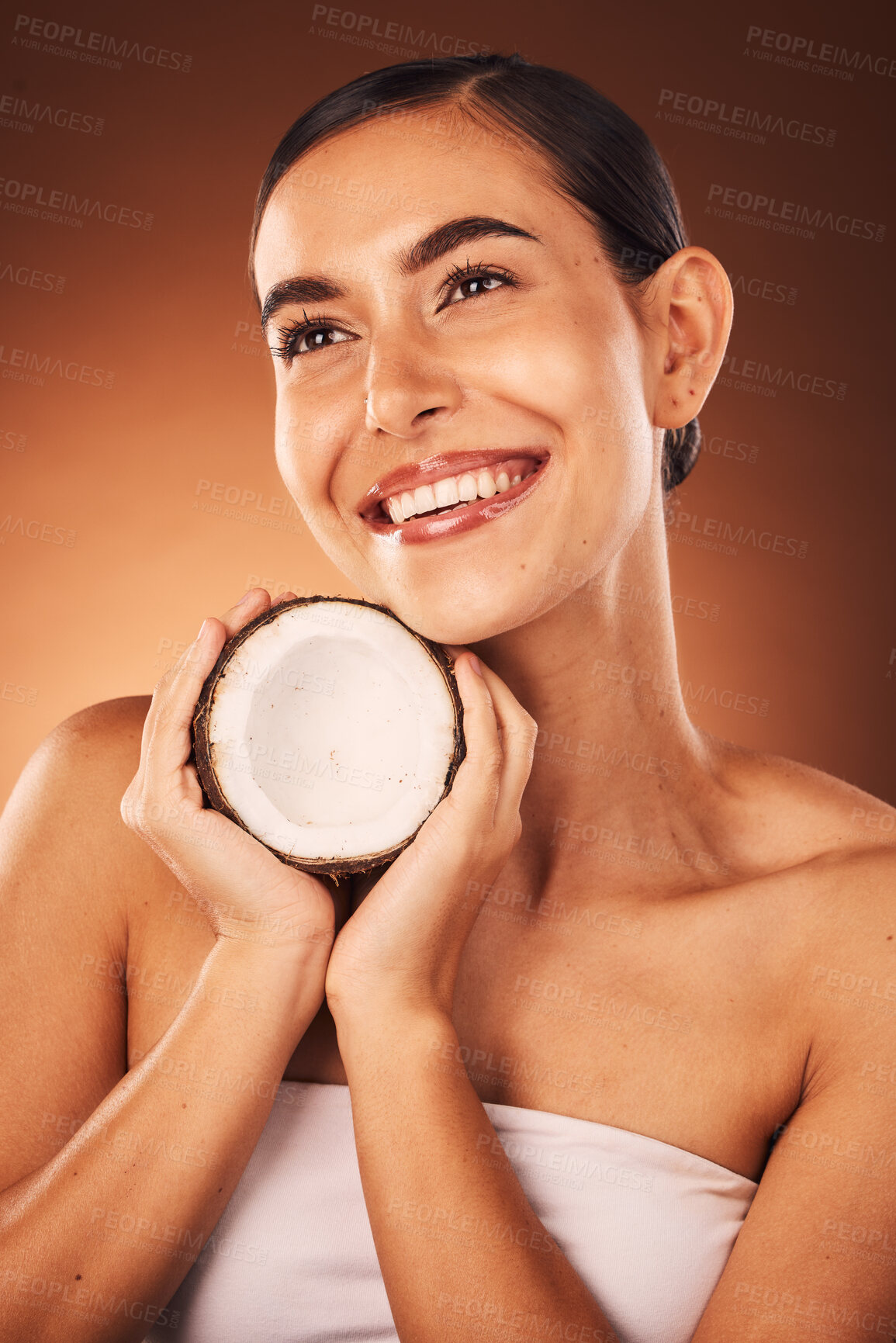 Buy stock photo Beauty, coconut and skincare, woman with natural and diy facial product for face, body and skin against studio background. Fruit, detox and healthy cosmetic with wellness and sustainable cosmetics.
