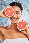 Beauty, water splash and grapefruit for skincare, black woman in portrait, natural vegan and healthy cosmetics for detox and skin. Fruit, vitamin c and water with splash for hydration and cosmetic.