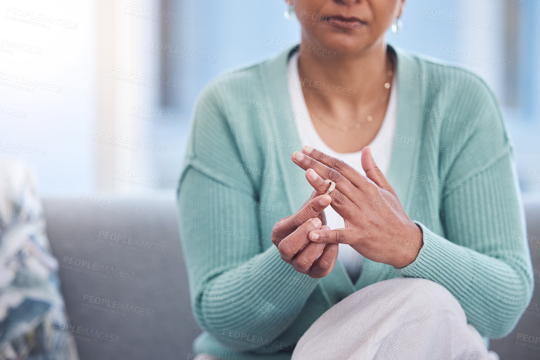 Buy stock photo Doubt, stress and hands taking off ring for a divorce after marriage conflict, toxic relationship or cheating. Anxiety, mental health or sad senior woman removing her engagement ring after fighting