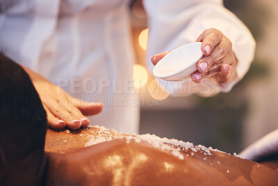 Buy stock photo Massage, spa and scrub on a back for exfoliate treatment for soft, healthy and smooth skin. Luxury, wellness and therapist doing salt body exfoliation detox for health, hygiene and body care at salon