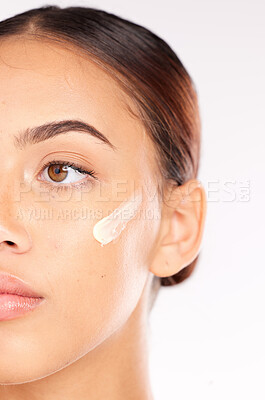 Buy stock photo Skincare cream, half face and woman with beauty wellness, spa cosmetics and thinking against white studio background. Luxury product, facial moisturiser and model with sunscreen or dermatology lotion