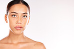 Skincare, beauty and portrait of Latin woman on a white background studio for dermatology, body care and heath. Wellness, spa and face of girl with facial treatment, skincare products and cosmetics