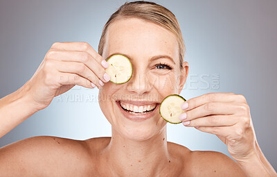 Buy stock photo Woman, face and cucumber for skincare grooming in organic healthcare, vegan collagen wellness and facial product treatment. Portrait, smile and happy beauty model with vegetables in Canada self care