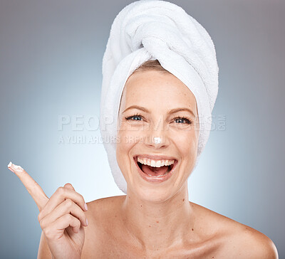 Buy stock photo Beauty, skincare and product with portrait of woman and facial cream for shower, luxury and spa. Sunscreen, cosmetics and lotion on face of model with towel for cleaning, moisturizer and dermatology