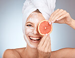 Skincare, beauty and portrait of woman with grapefruit in studio for natural, organic and healthy skincare products. Wellness, spa and face of girl with fruit for cosmetics, facial mask and treatment