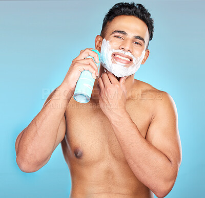 Buy stock photo Man, face skincare or shaving cream in grooming routine, hair removal treatment or hair growth management. Portrait, smile or happy model and shave foam in beard wellness on Brazilian blue background