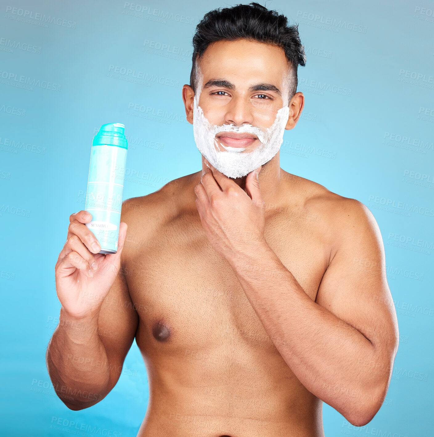 Buy stock photo Man, facial beauty and shaving foam for beard grooming care portrait, hair removal or cosmetics hygiene in studio. Luxury skincare wellness, happy skincare treatment and shave face in blue background