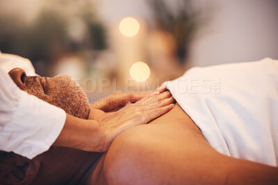 Buy stock photo Massage, spa and therapist hands with man client in luxury, zen or calm room with physical therapy, wellness and vacation healing. Bokeh, healthcare service and beauty worker giving a body treatment