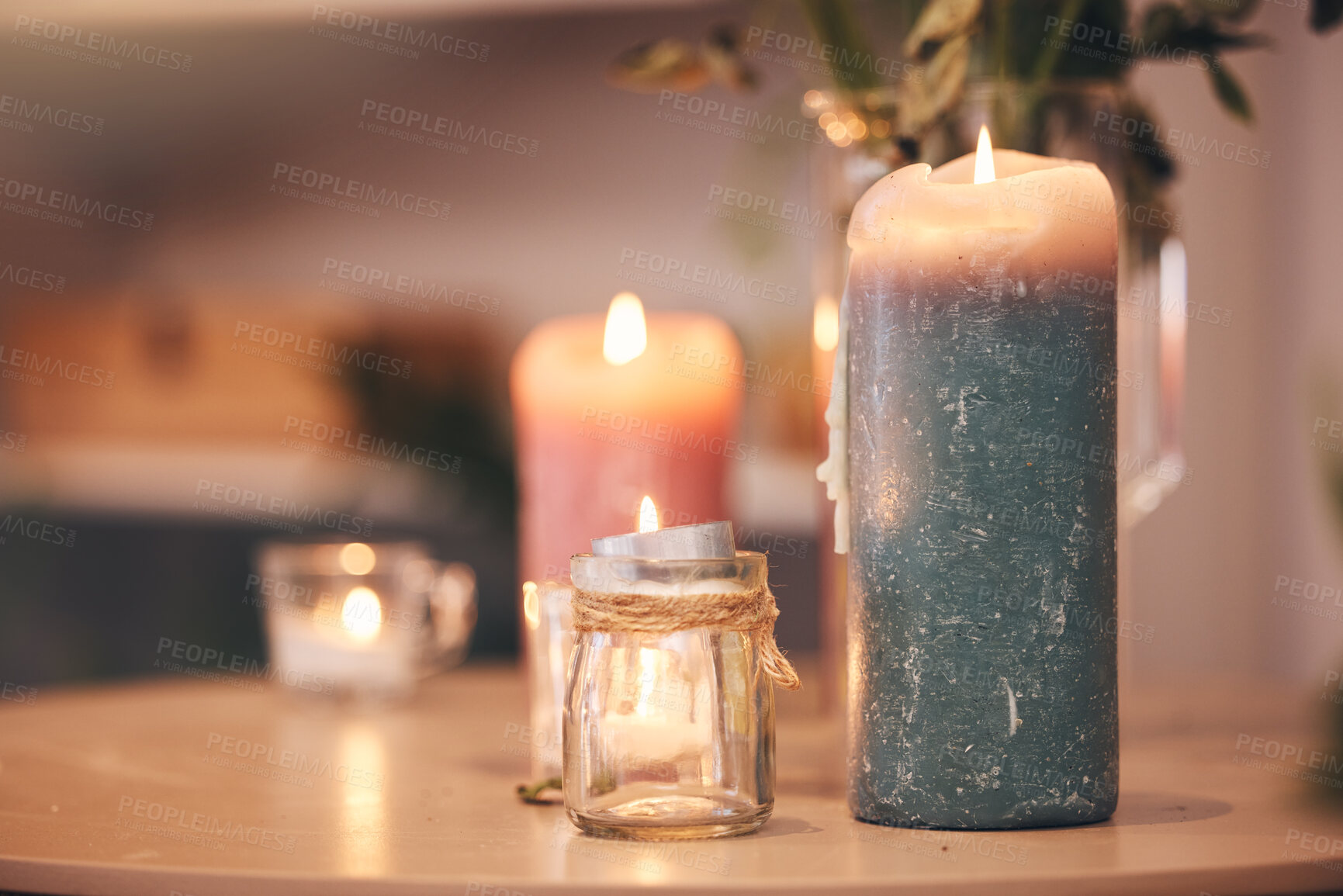 Buy stock photo Candles, zen and spa wellness aromatherapy for zen, relax and luxury experience for a massage. Fire, care and physical therapy room with calm, balance and beauty atmosphere in a salon with no people