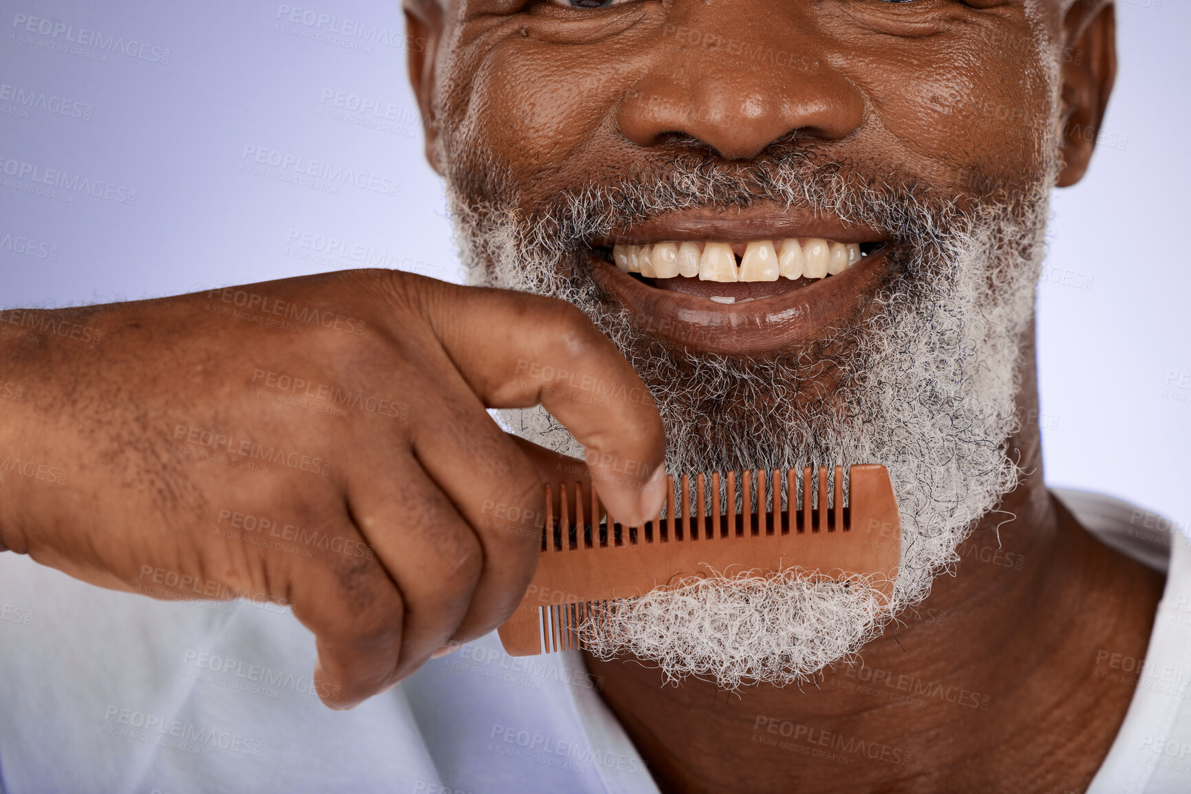 Buy stock photo Senior man, face and beard comb in studio isolated on a purple background. Hair care, smile and wellness of happy elderly black man with grooming product for facial hair wellness, health and hygiene.