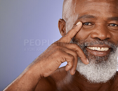 Buy stock photo Aesthetic, senior and black man skincare portrait with smile for wellness, health and dermatology zoom. Mature, happy and african cosmetic model touching face on purple studio marketing mockup.