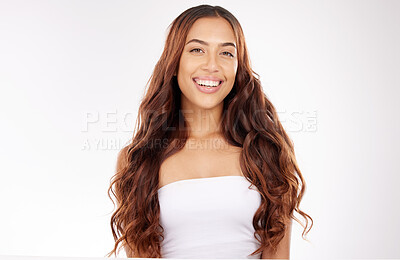 Buy stock photo Beauty, hair care and portrait of a happy woman in studio for a keratin, brazilian or botox treatment. Hair, wellness and girl model with long, shiny and curly hair style isolated by white background